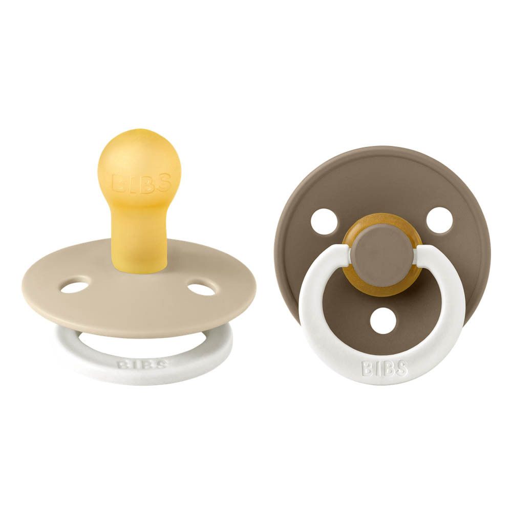 Deux sucettes, beige et marron, anneau blanc. Tétine jaune. Logo BIBS.