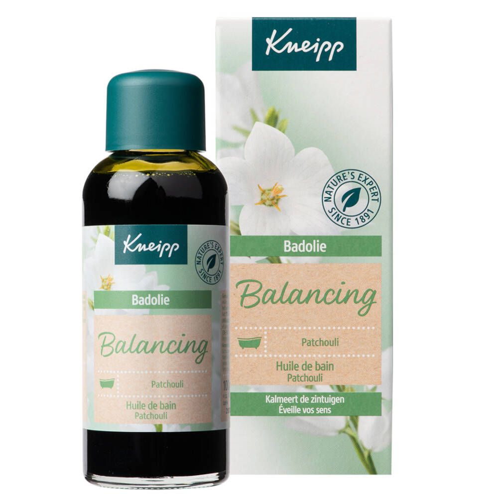 Flacon et emballage Kneipp Badeöl Patchouli. Vert, marron et blanc. Huile de bain avec motif floral.