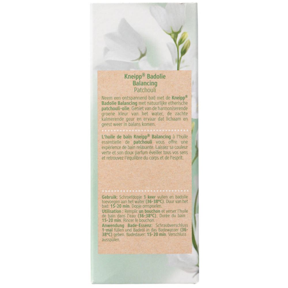 Dos de l'emballage Kneipp Badeöl Patchouli. Texte en allemand, français et néerlandais. Design floral.