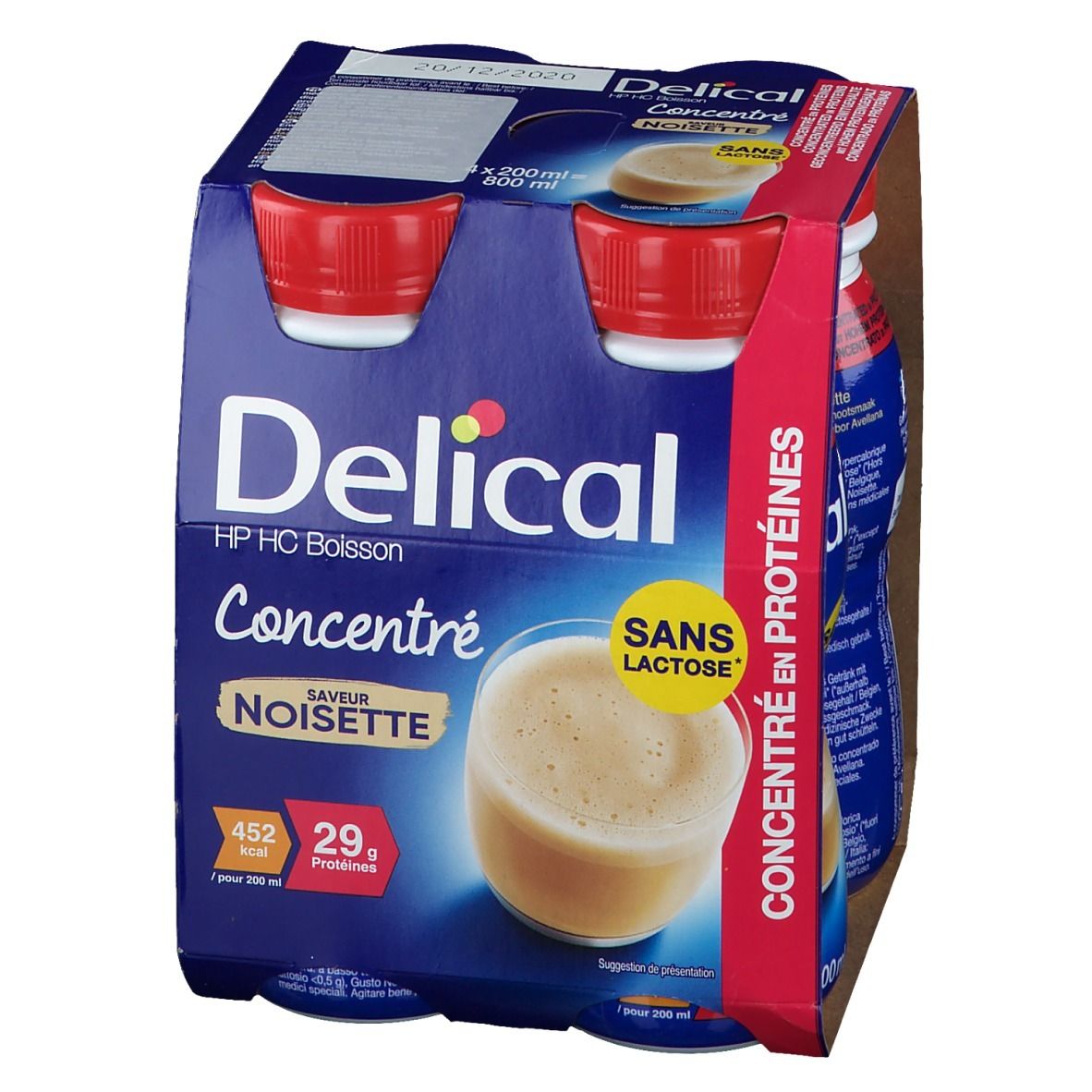 Emballage de quatre bouteilles Delical HP HC Boisson Concentré Noisette. Emballage bleu, bouchons rouges, texte : Sans Lactose, 29g protéines.