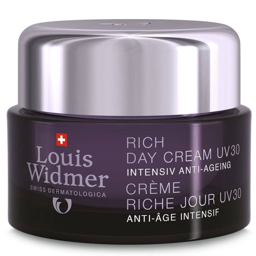 Pot violet foncé avec couvercle argenté. Inscription: Louis Widmer, Rich Day Cream UV30, Anti-Âge.