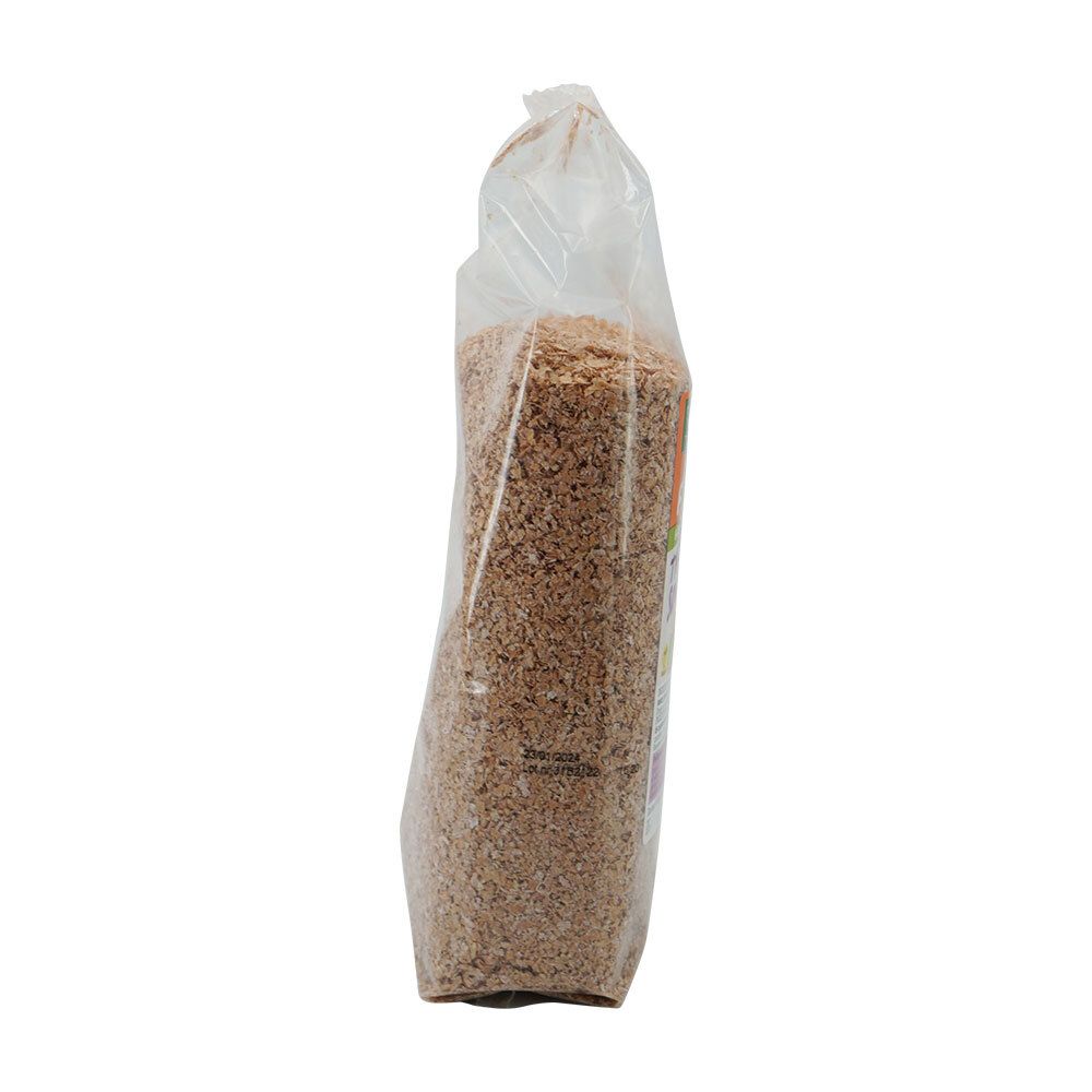 Zijaanzicht van de transparante verpakking met Damhert Fibre Fit Weizenkleie BIO. Inhoud zichtbaar.