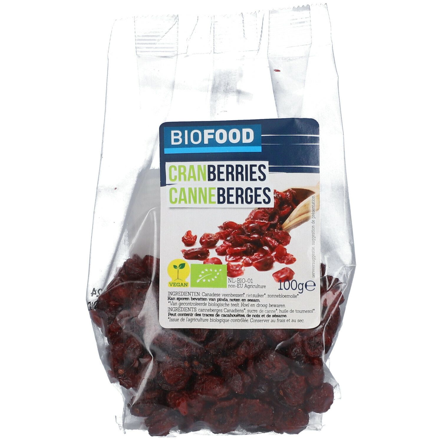 Klare Tüte mit BIOFOOD Cranberries. Rote, getrocknete Cranberries. Aufkleber mit Produktinformationen und Vegan-Logo.