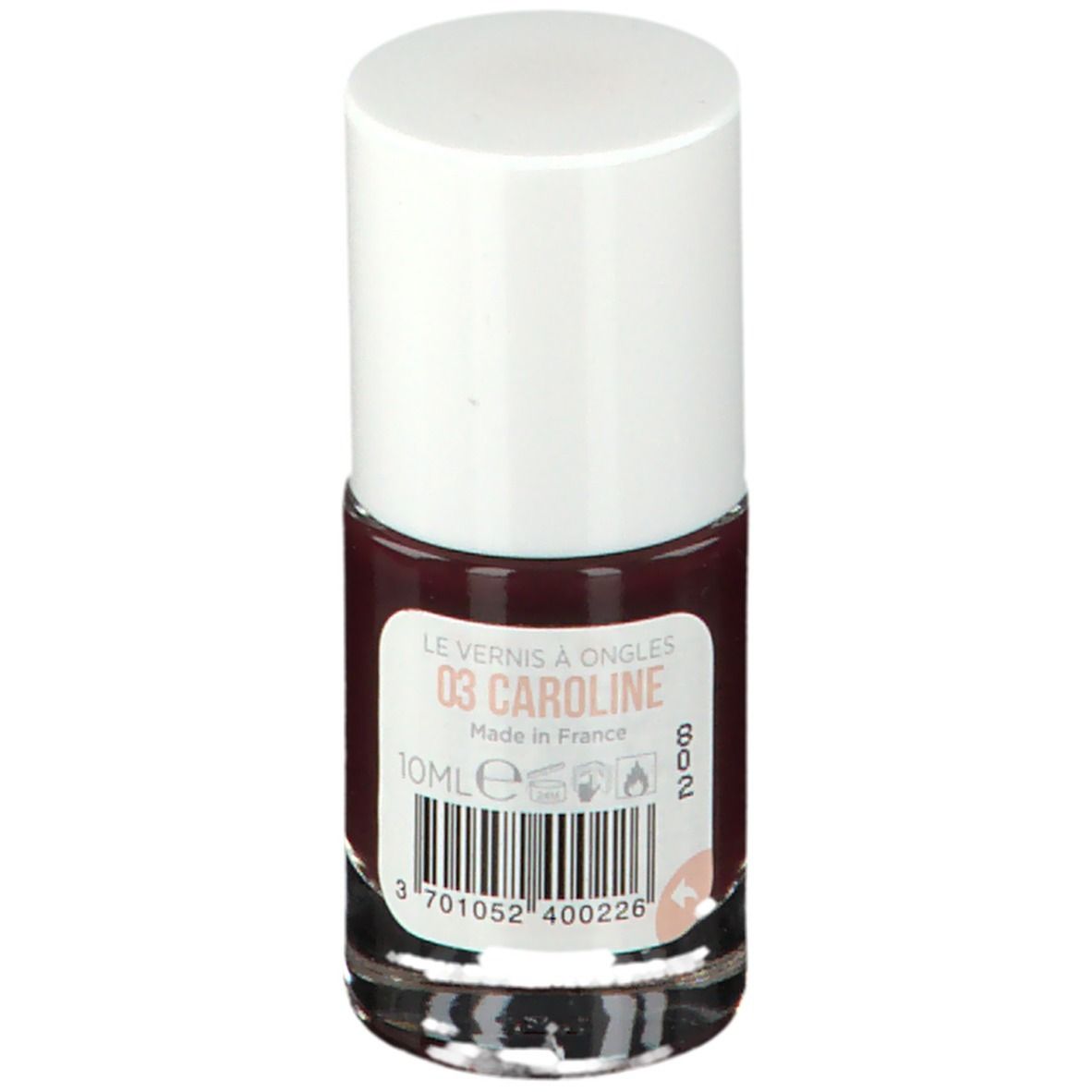 Donkerrode nagellakfles. Witte dop, transparante glazen fles. Opschrift: 03 CAROLINE, 10ml.