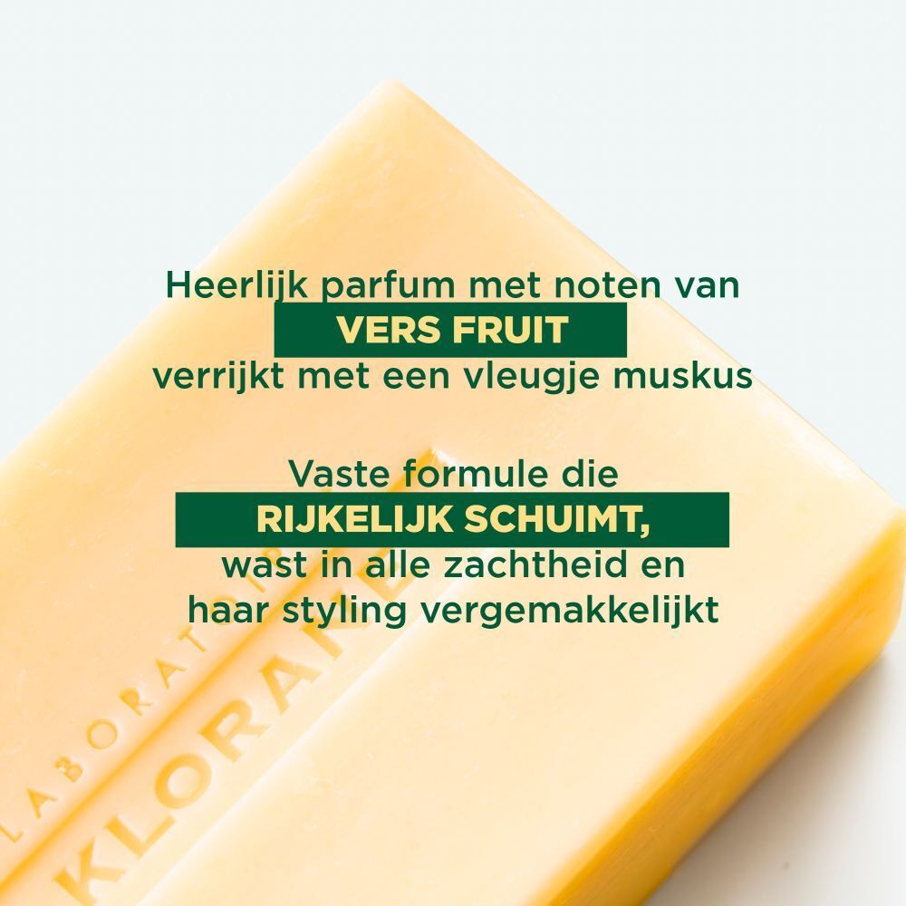 Klorane Mango Shampoo Bar. Gele zeep met tekst. Tekst over ingrediënten en voordelen.