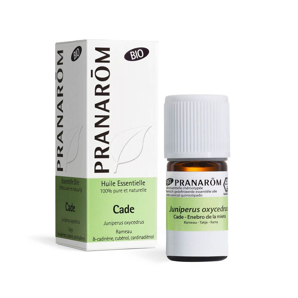 Produktverpackung und Flasche. Weiße Schachtel mit Marke Pranarôm und BIO-Zertifizierung. Braune Glasflasche mit weißem Deckel.