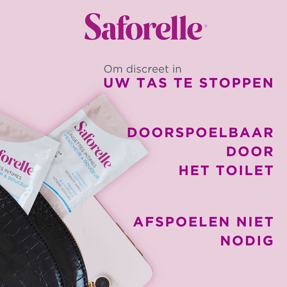 Deux sachets individuels de lingettes intimes Saforelle à côté d'un smartphone et d'un sac à main noir. Texte : Jetable dans les toilettes.