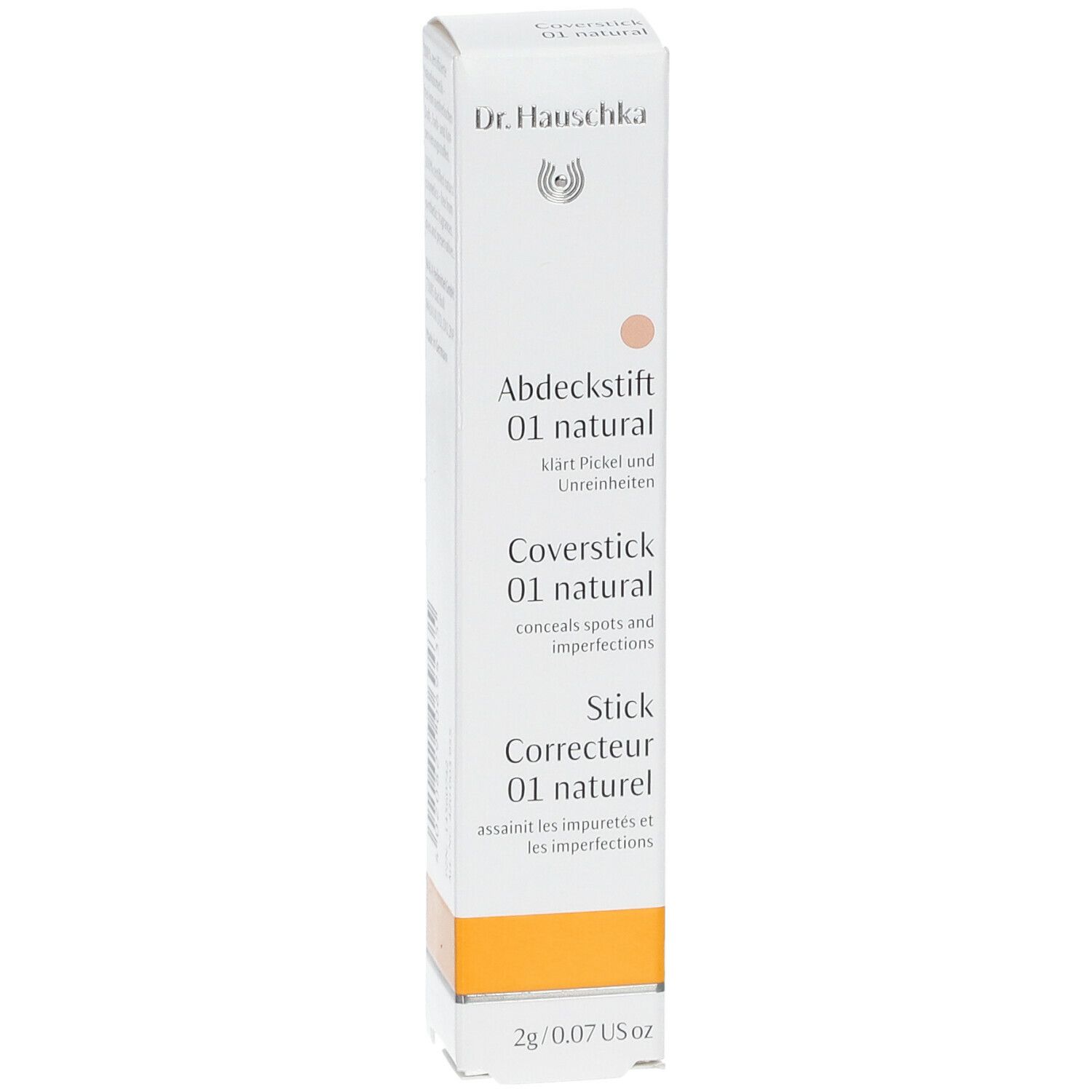 Face avant de l'emballage du Dr. Hauschka Stick Correcteur 01 natur. Blanc avec accents orange. Nom du produit et logo.