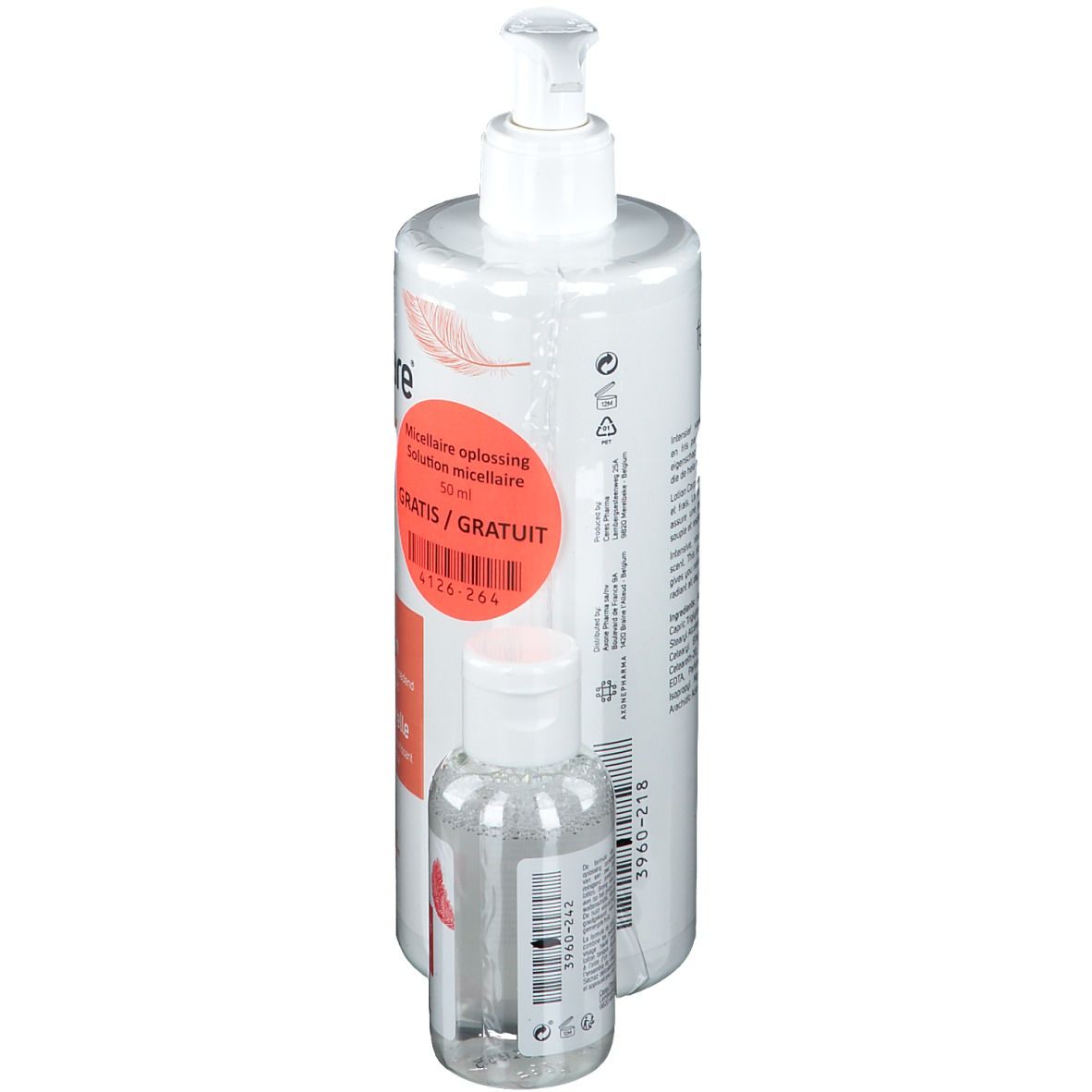 Lotion corporelle et solution nettoyante. Flacon blanc avec pompe et petit flacon transparent.