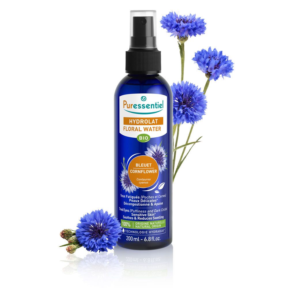 Flacon bleu avec vaporisateur et bleuets. Inscription: Puressentiel, Hydrolat Floral Water, Bio.