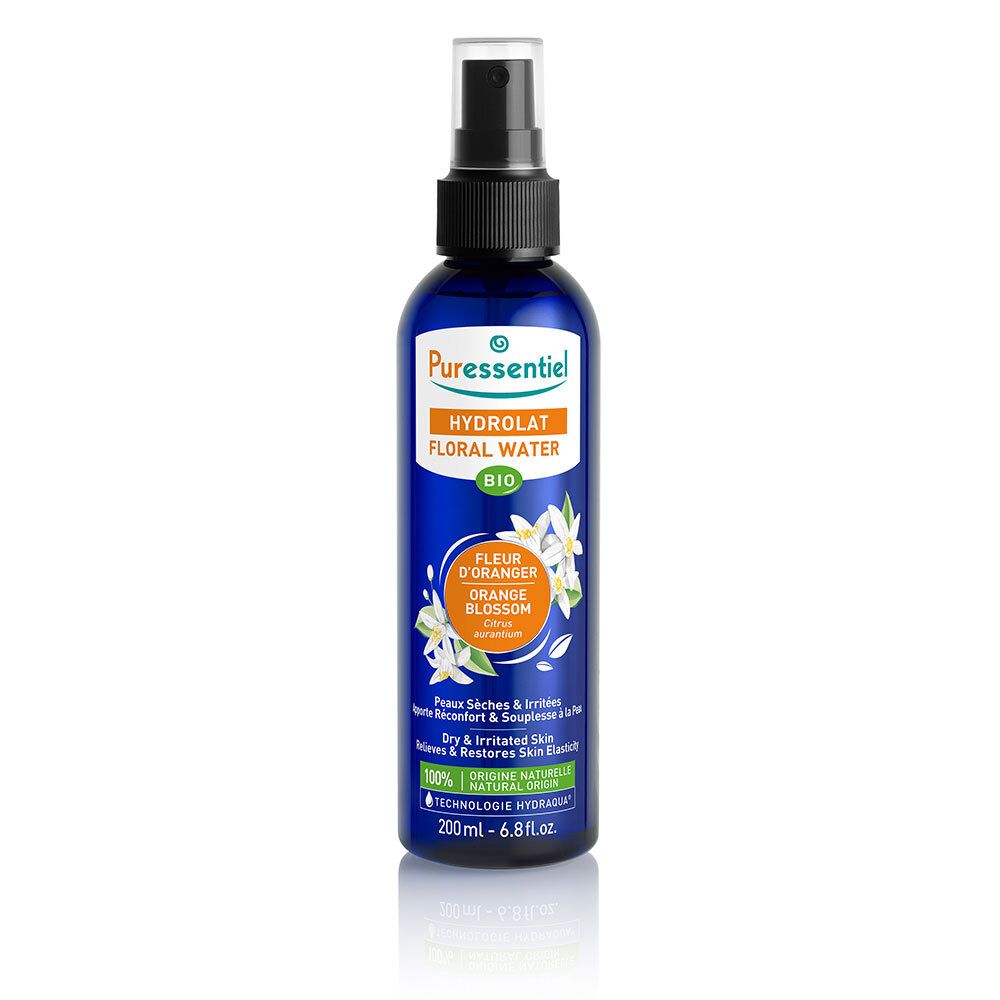 Blauwe fles met verstuiver. Opschrift: Puressentiel, Hydrolat, Floral Water, Bio. Illustratie van oranjebloesem.