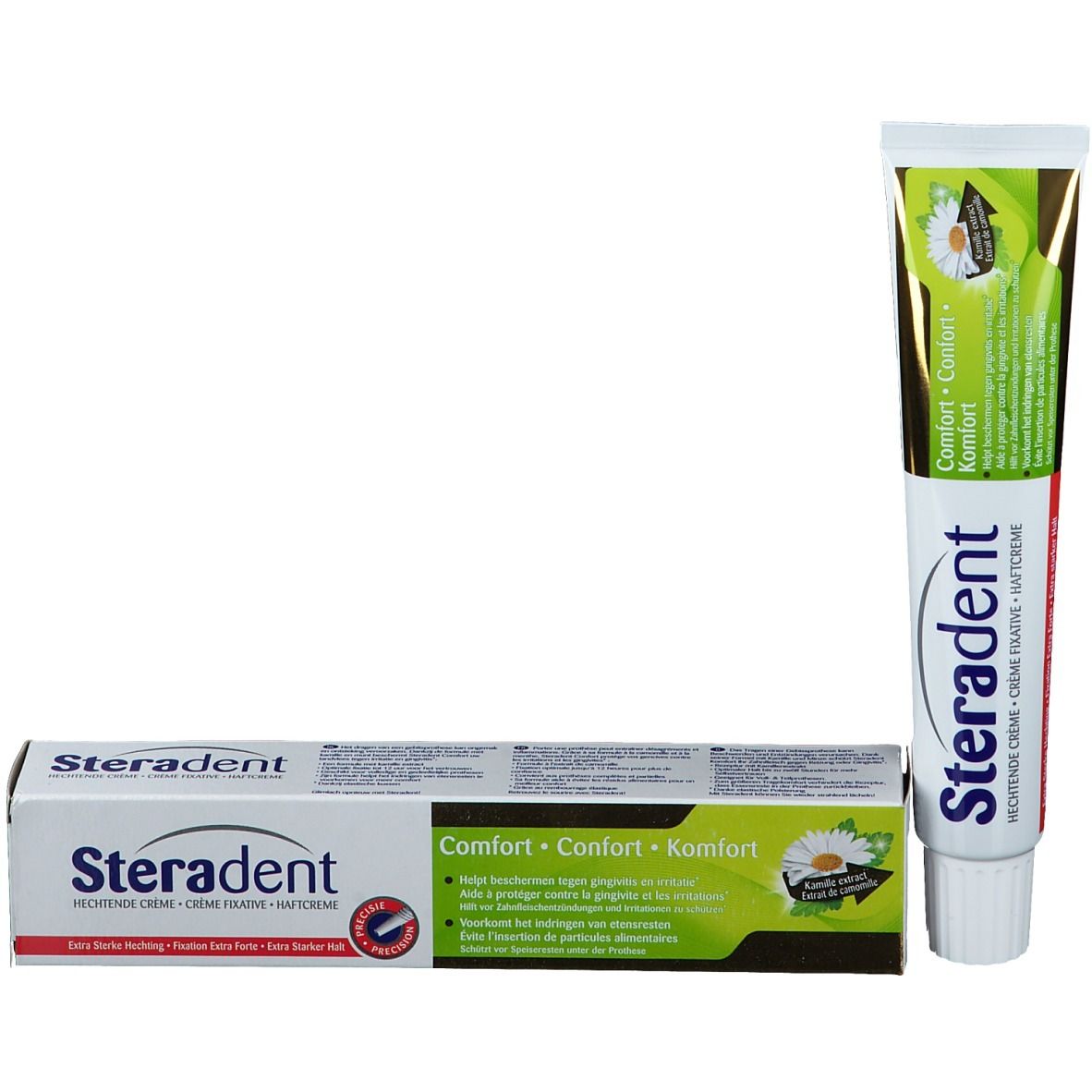 Tube de crème dentaire et boîte. Inscription: Steradent, Comfort. Emballage vert et blanc avec fleur de camomille. Boîte à côté.