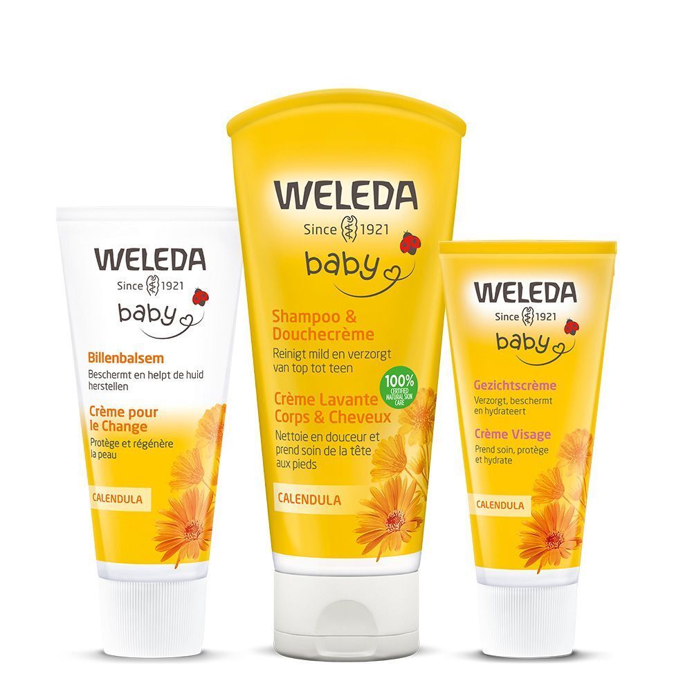Drei Baby-Pflegeprodukte von WELEDA. Gelbe und weiße Tuben mit Produktnamen und Inhaltsangaben. Aufschrift: Baby, Calendula.