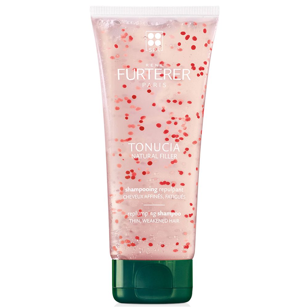 Transparante tube met rode deeltjesvloeistof. Opschrift: FURTERER PARIS, TONUCIA, NATURAL FILLER. Groene dop.