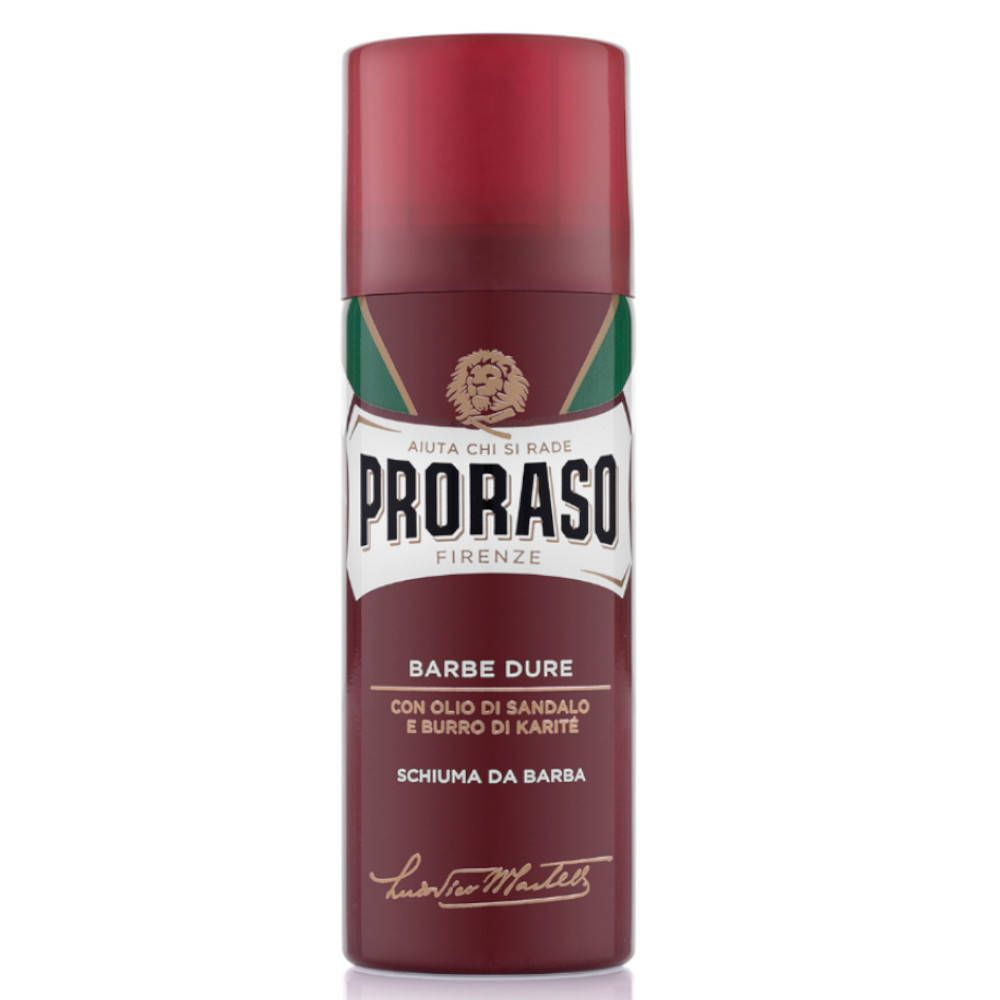 Flacon de mousse à raser rouge et marron. Inscription : PRORASO, Barbe Dure, Schiuma da Barba. Huile de santal et beurre de karité.