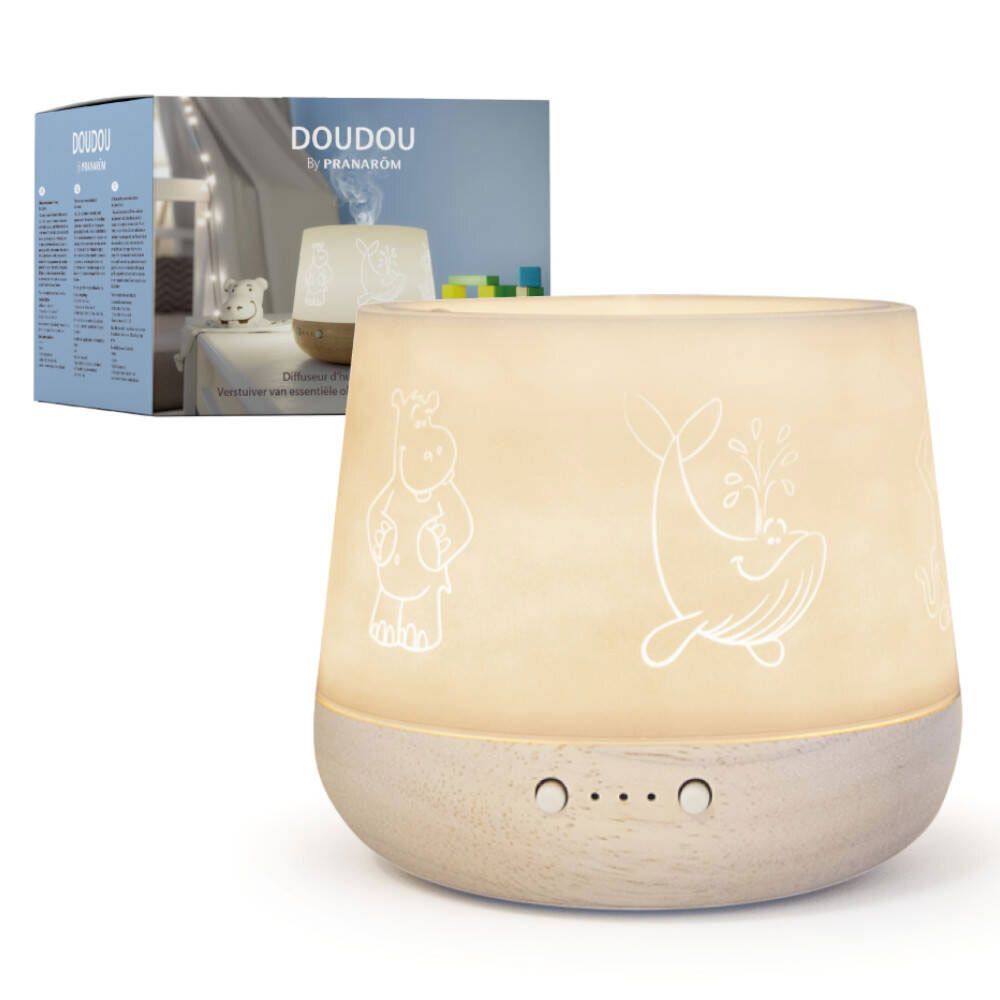Emballage du produit avec diffuseur. Le diffuseur est blanc avec une base en bois et des contours d'animaux. 'Doudou' est écrit.
