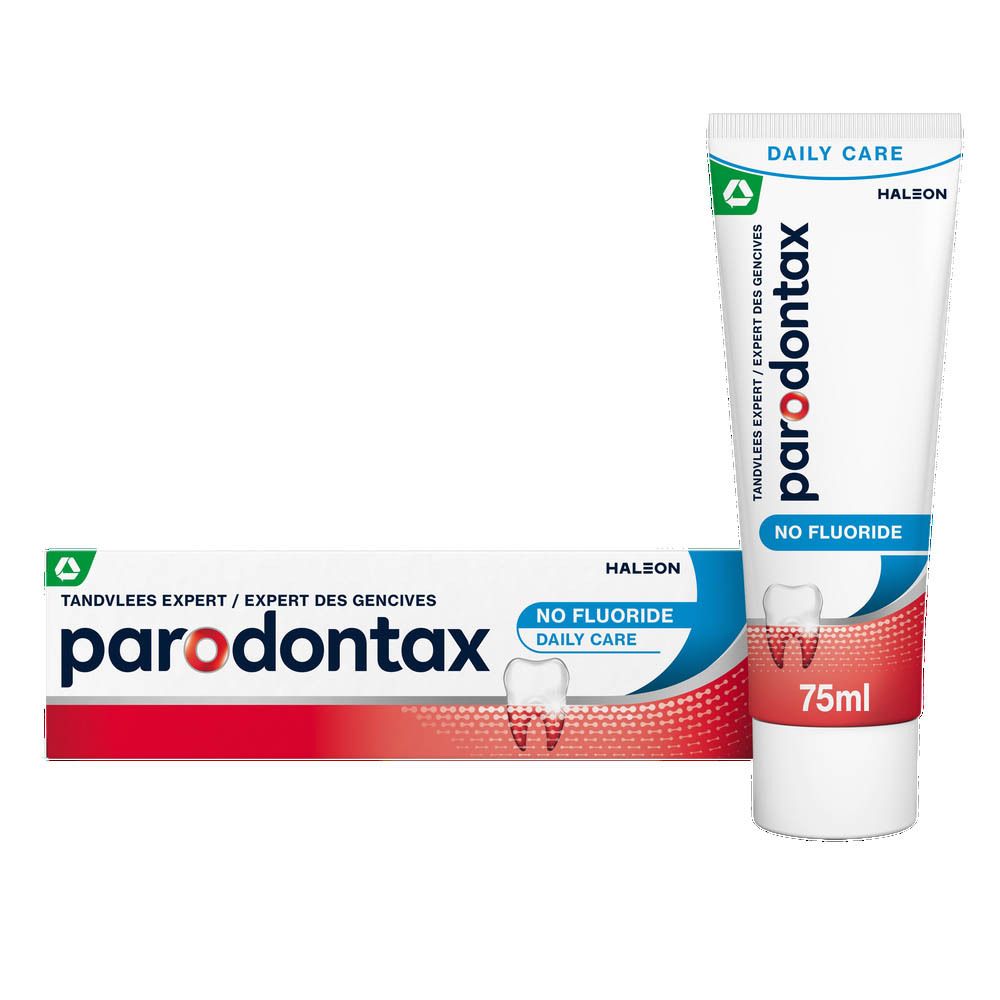 Tube de dentifrice. Blanc, rouge, bleu. Inscription : parodontax, No Fluoride, 75ml. Logo vert.