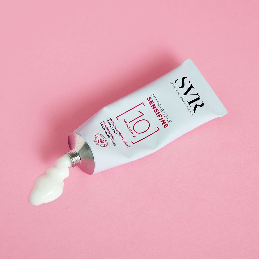 Doos SVR SENSIFINE NUTRI-BAUME. Productinformatie en ingrediënten. Roze en wit.