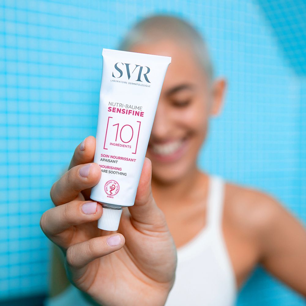 Doos SVR SENSIFINE NUTRI-BAUME. Productinformatie en ingrediënten. Roze en wit.