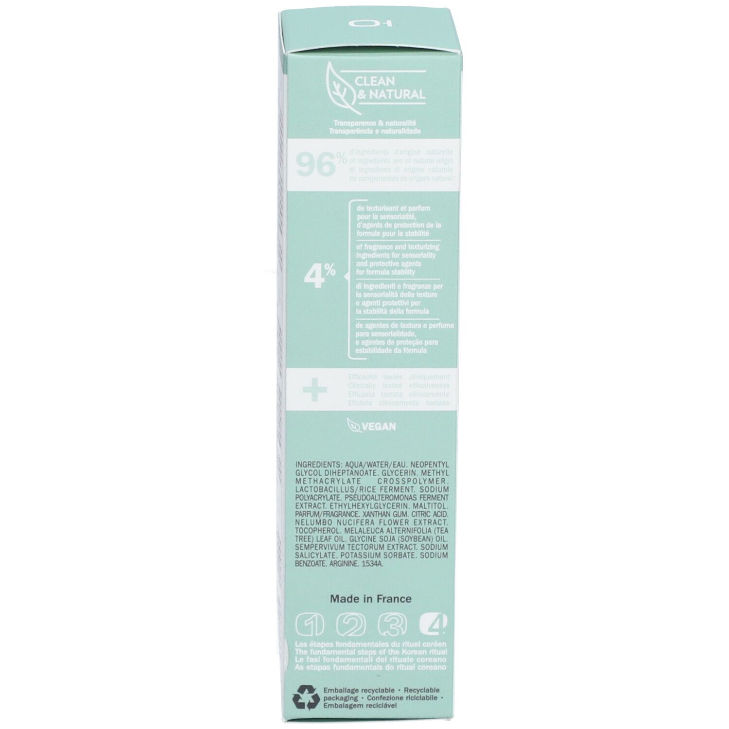 Dos de l'emballage du produit. Texte: ingrédients, vegan, symbole de recyclage, certifications.
