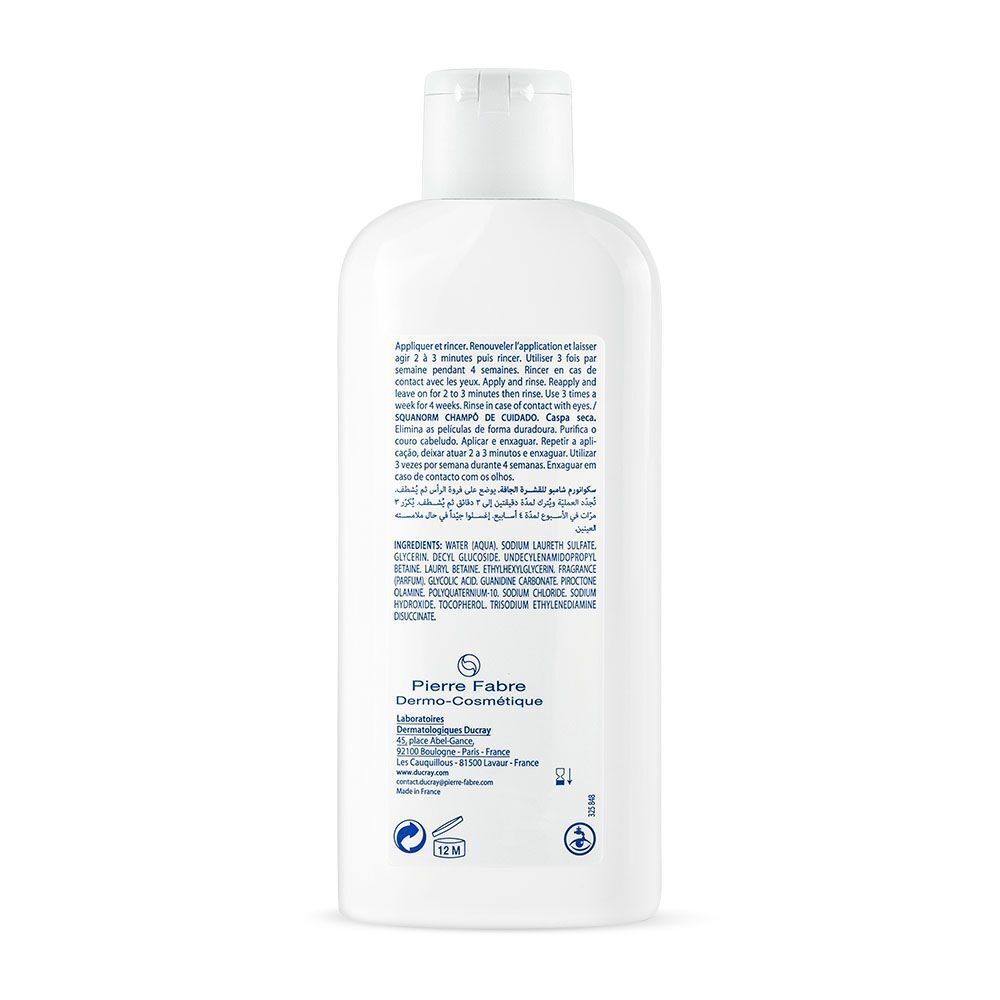 Achterkant van de shampoo fles. Tekst: toepassing, ingrediënten, Pierre Fabre, 12M symbool.