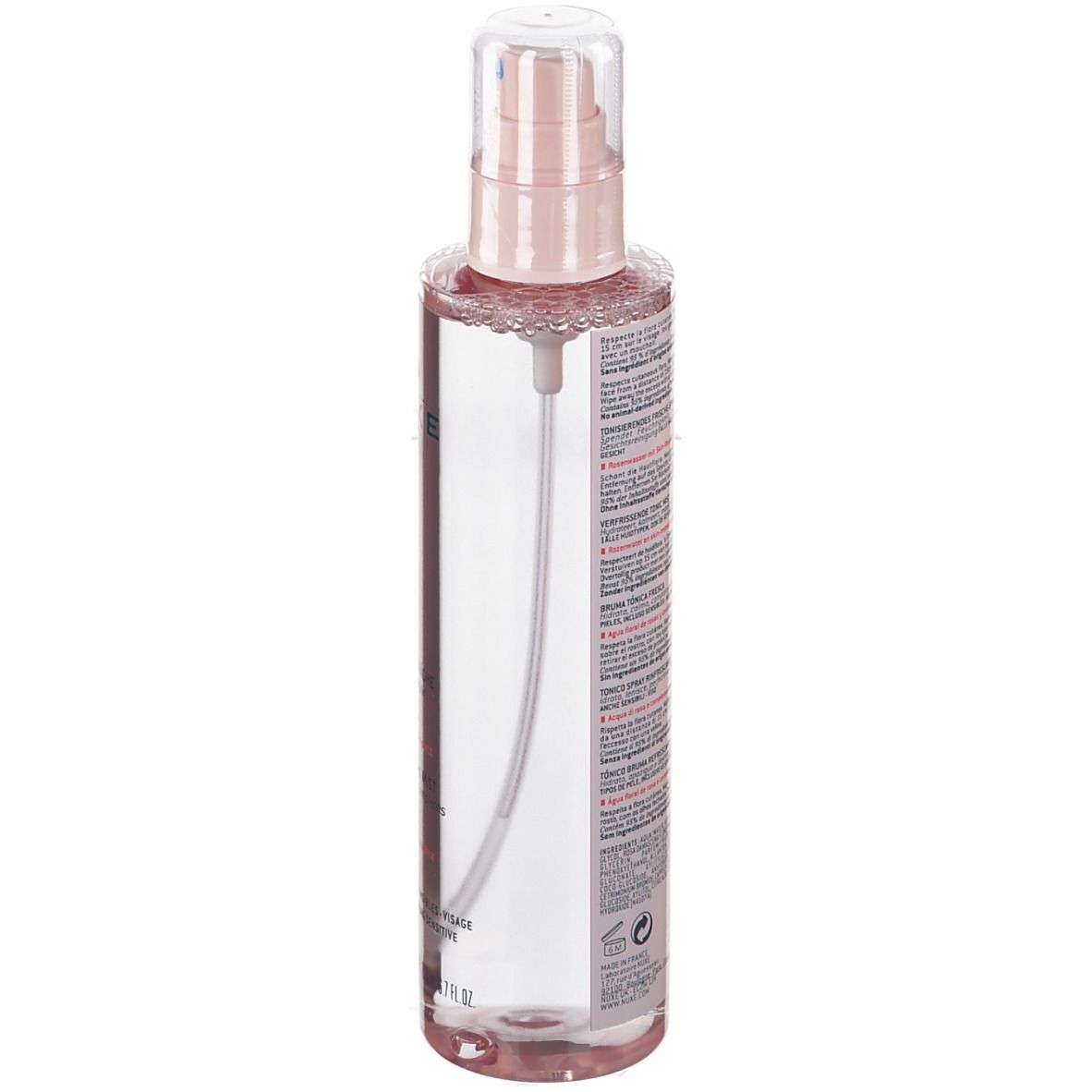 Transparante fles met roze dop en verstuiver. Tekst op de achterkant in verschillende talen.