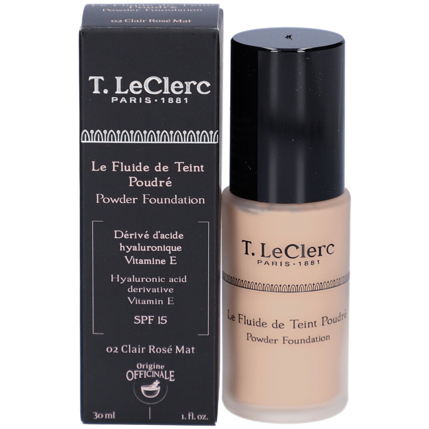 Foundation-Fläschchen und Schachtel. Aufschrift: T. LeClerc Paris. Produktname: Le Fluide de Teint Poudré Powder Foundation. SPF 15.