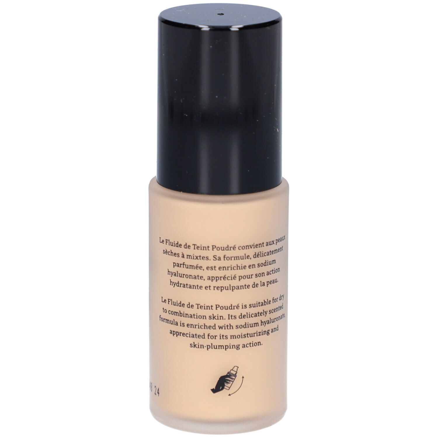 Beige Foundation-Flüssigkeit in einer zylindrischen Flasche mit schwarzem Deckel. Text auf der Flasche.