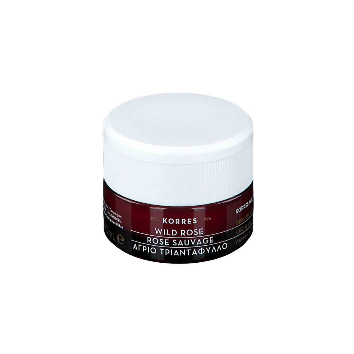 KORRES Wild Rose crème de jour. Couvercle blanc, contenant bordeaux. Texte: Wild Rose, Rose Sauvage, ΑΓΡΙΟ ΤΡΙΑΝΤΑΦΥΛΛΟ.