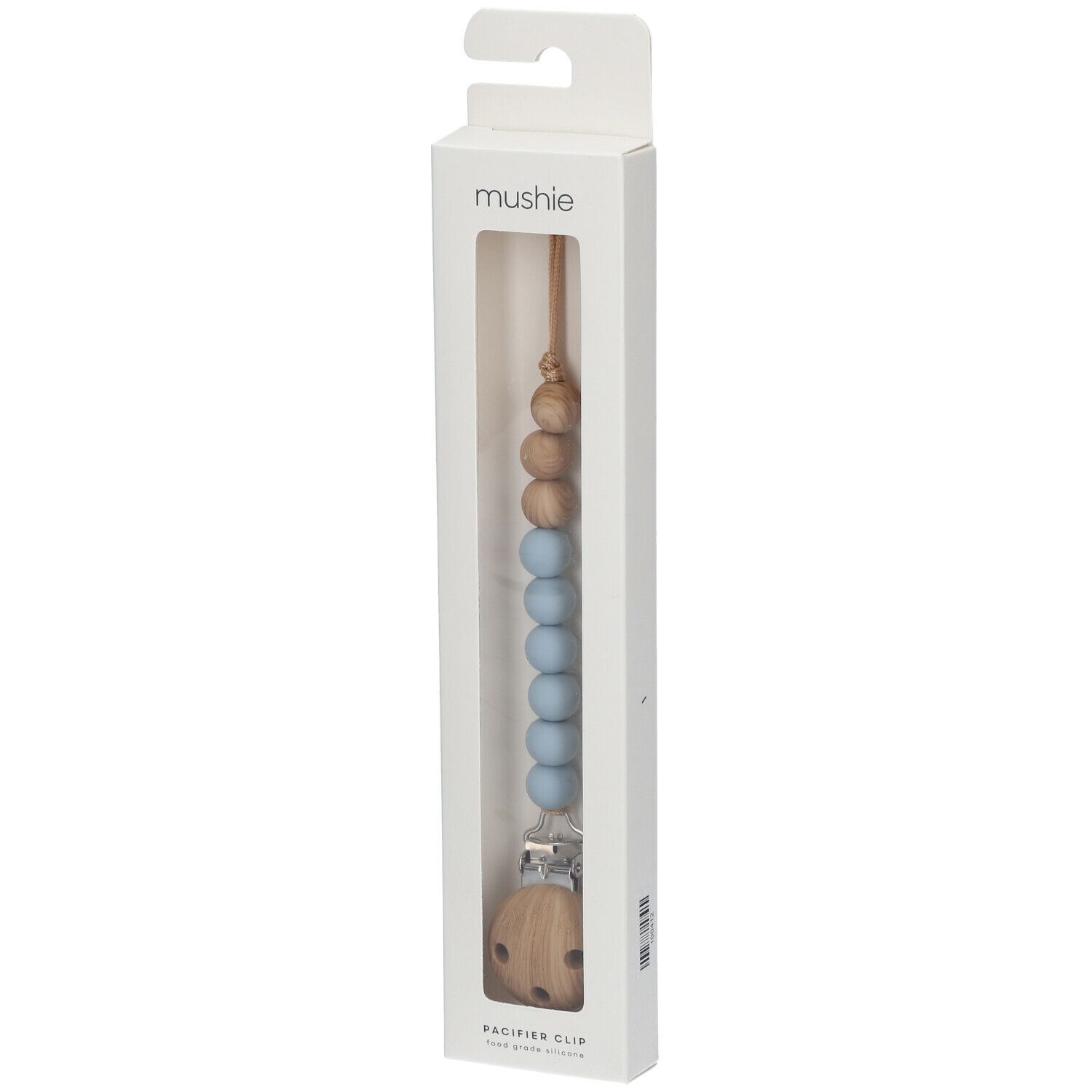 Schnullerkette in Verpackung. Holz- und blaue Silikonperlen, Holzclip. Marke: mushie. "PACIFIER CLIP" steht unten.