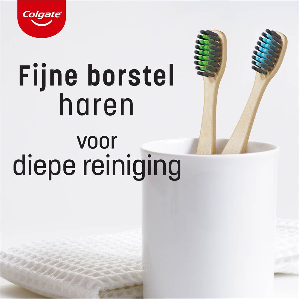 Colgate bamboe tandenborstel. Blauwe borstelharen, bamboe handvat, verpakking. Tekst: Bamboo Charcoal.