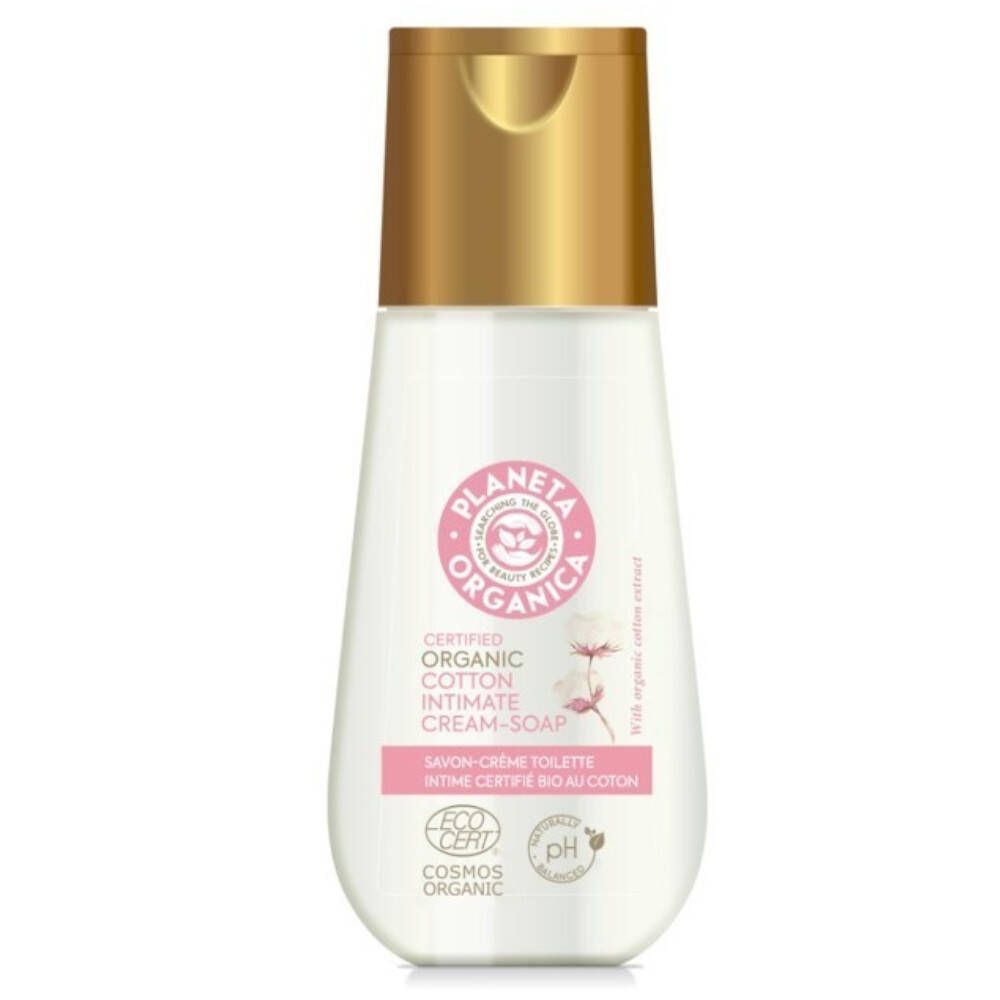 Flacon blanc avec bouchon doré. Étiquette rose avec texte et logo. "Planeta Organica" et "Intimreinigungslotion" visibles.