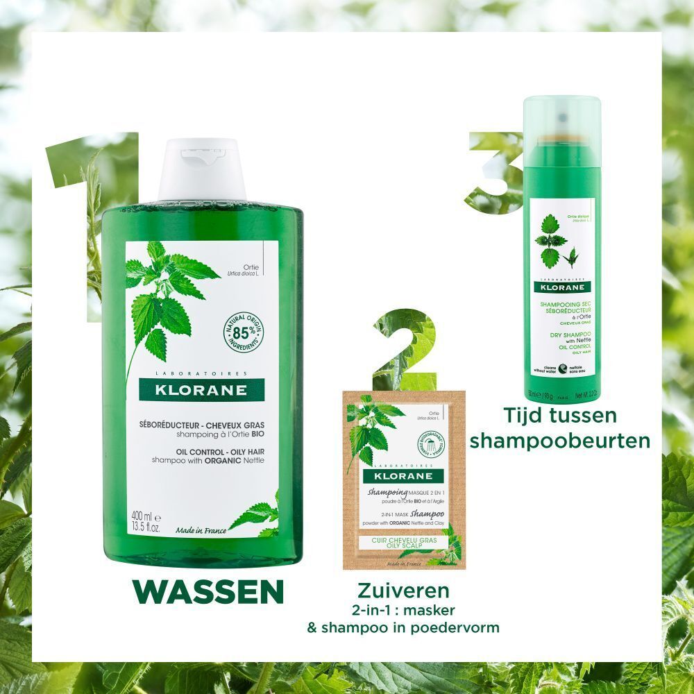 Klorane shampoo fles. Tekst: 85% natuurlijke ingrediënten. Vermindert talg. Kleine lettertjes.