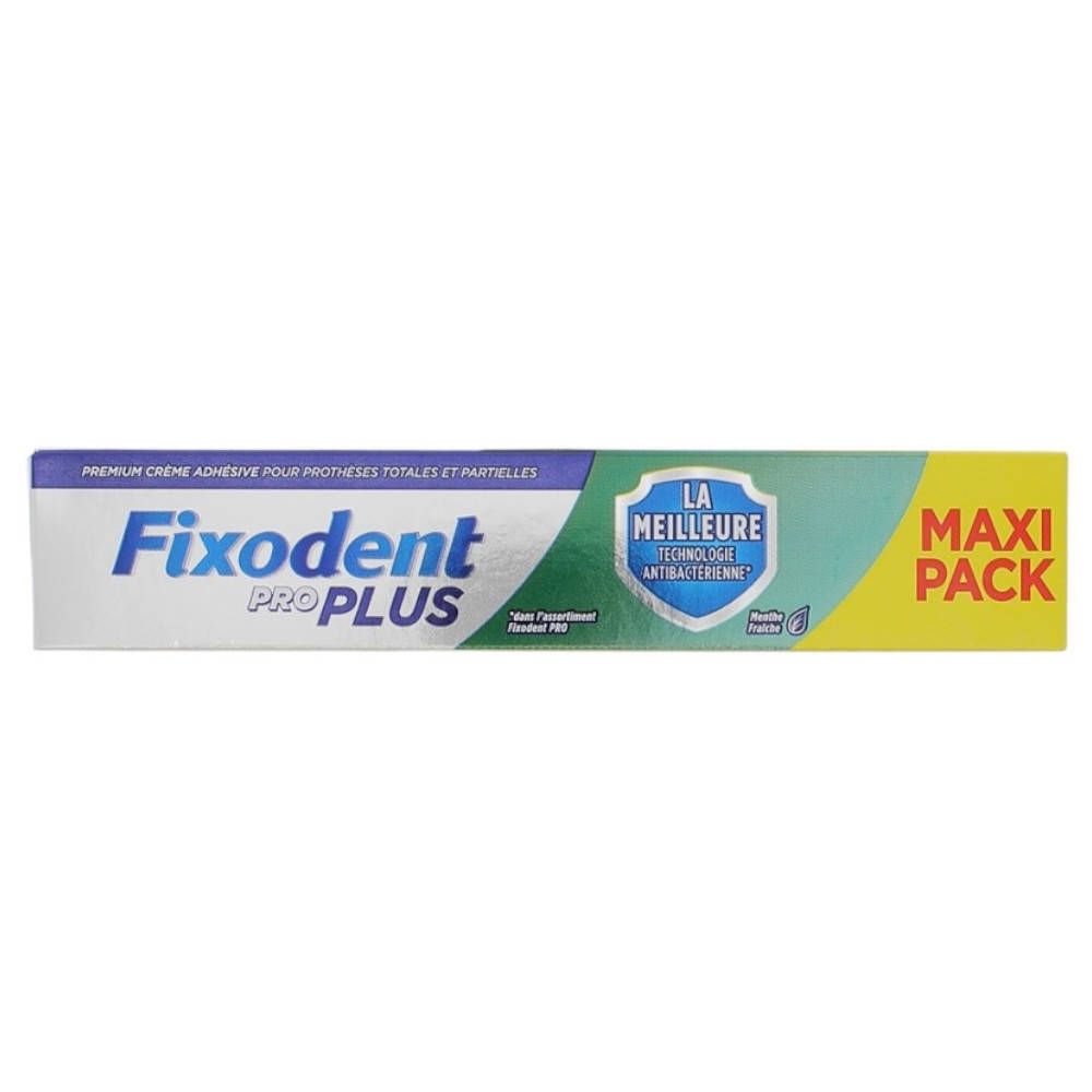Emballage de Fixodent Pro Plus. Couleurs bleu, vert et jaune. Inscription "Fixodent Pro Plus". "Maxi Pack" sur le côté.