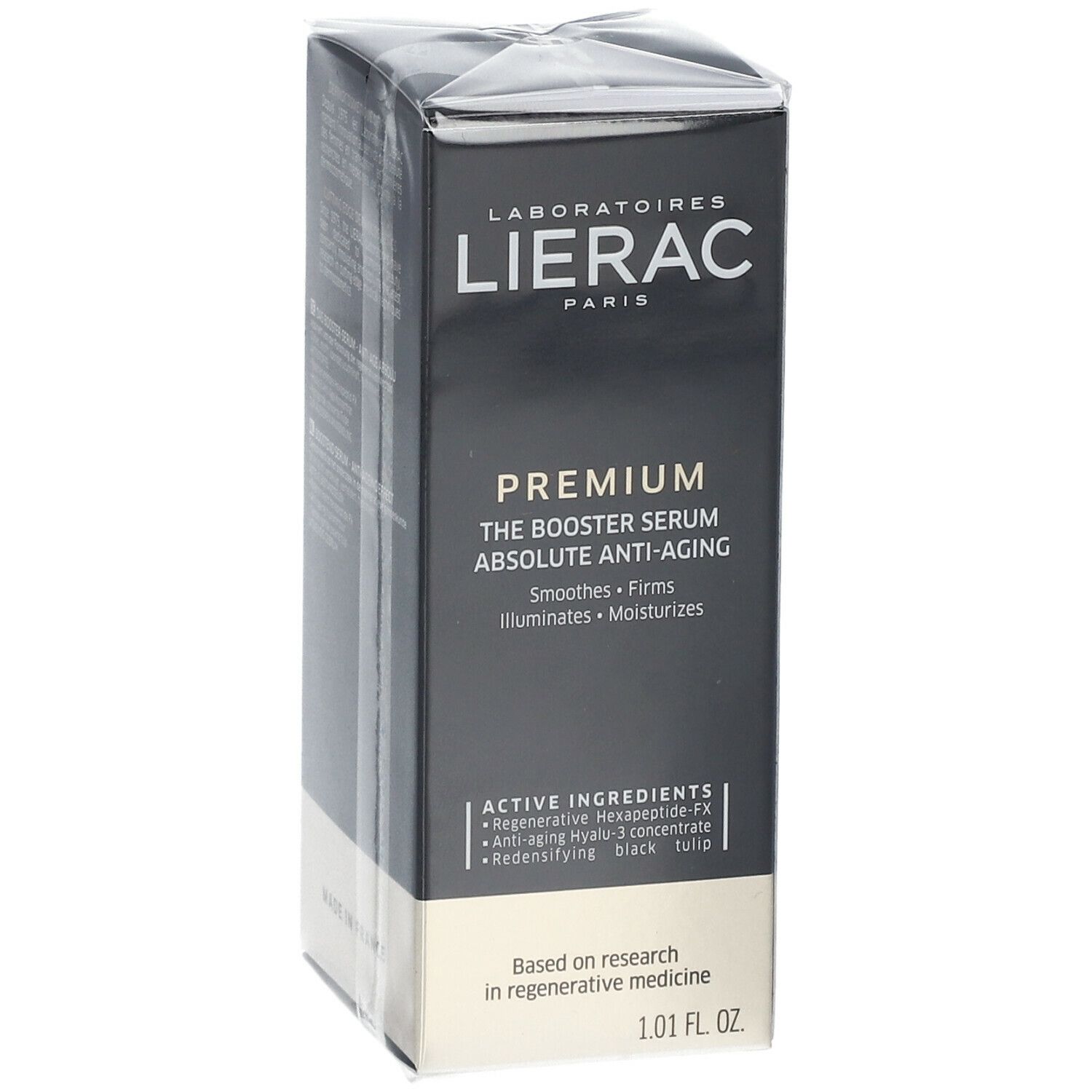 Emballage noir avec informations produit. Inscription: LIERAC PREMIUM The Booster Serum Absolute Anti-Aging. 1.01 FL OZ.