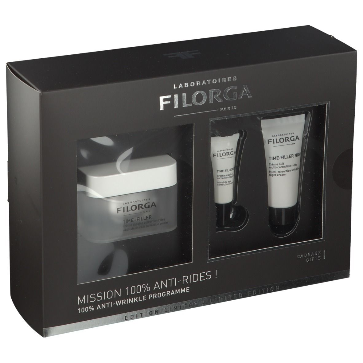 Schwarze Geschenkbox mit drei Produkten. Sichtbar: Creme-Tiegel, zwei Tuben. Schriftzug: FILORGA, TIME-FILLER.