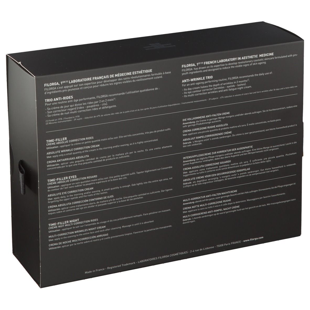 Rückseite der schwarzen Geschenkbox. Text in mehreren Sprachen. Produktnamen: TIME-FILLER, Augencreme, Nachtcreme.