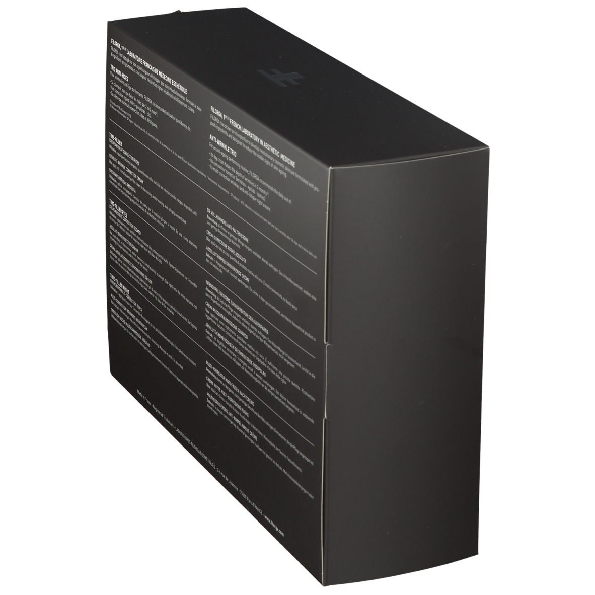 Schwarze Geschenkbox, schräg. Rückseite mit Text. Produktnamen: TIME-FILLER, Augencreme, Nachtcreme.