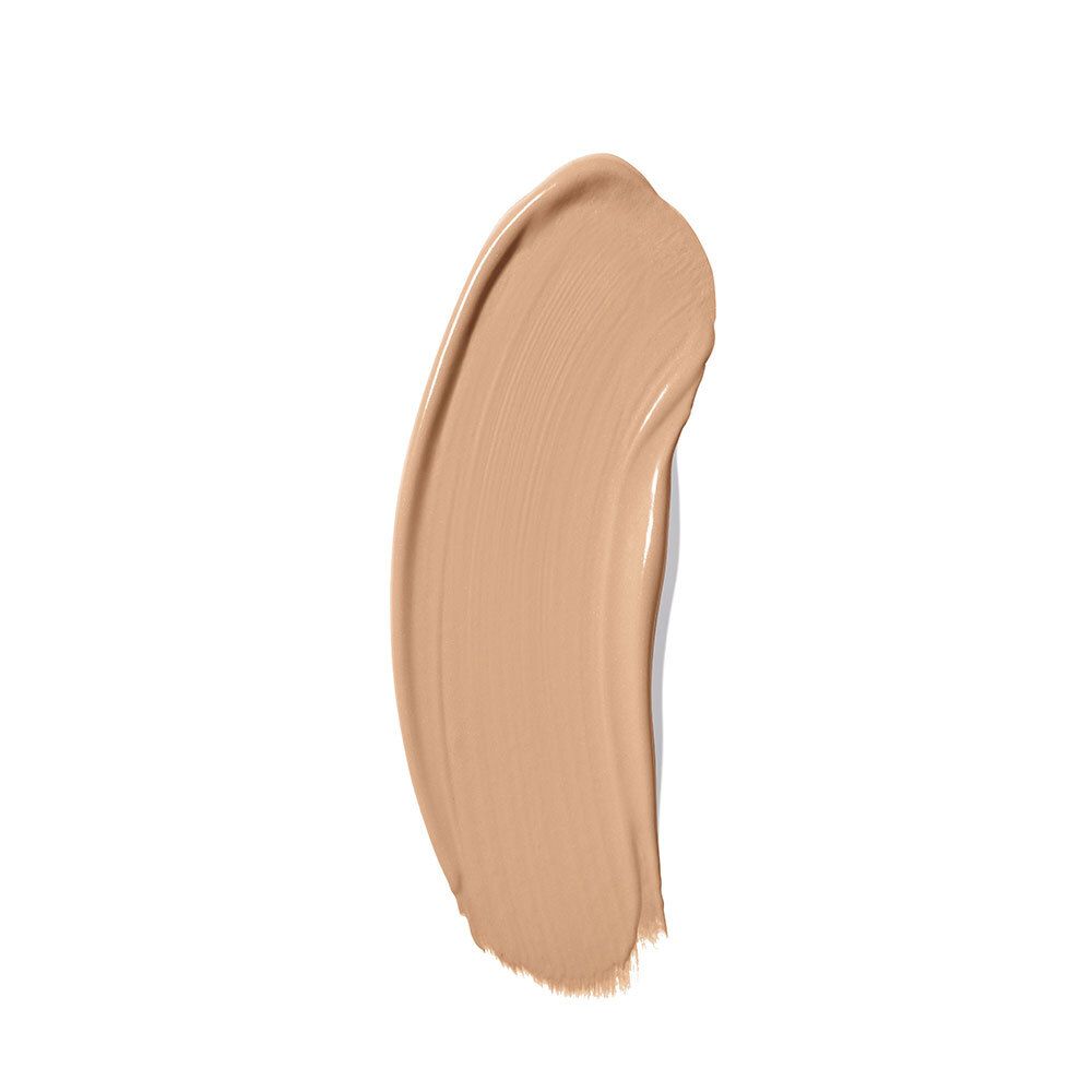 Beige crèmelaag op witte achtergrond. Tint medium beige.