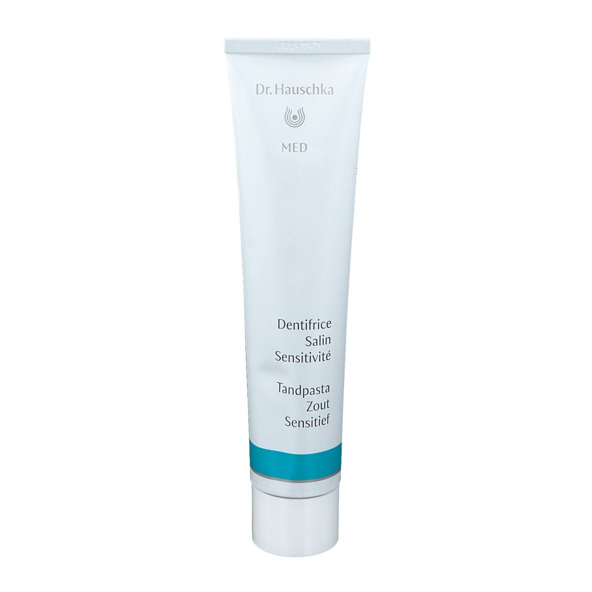 Tube de dentifrice blanc avec accent bleu. Inscription : Dentifrice Salin Sensitivité, Tandpasta Zout Sensitief.
