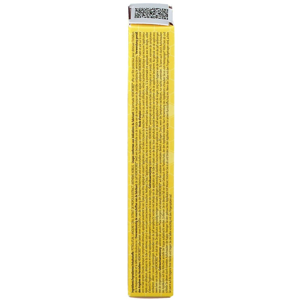 Dos de la boîte. Texte multilingue. Fond jaune. Informations sur le produit.