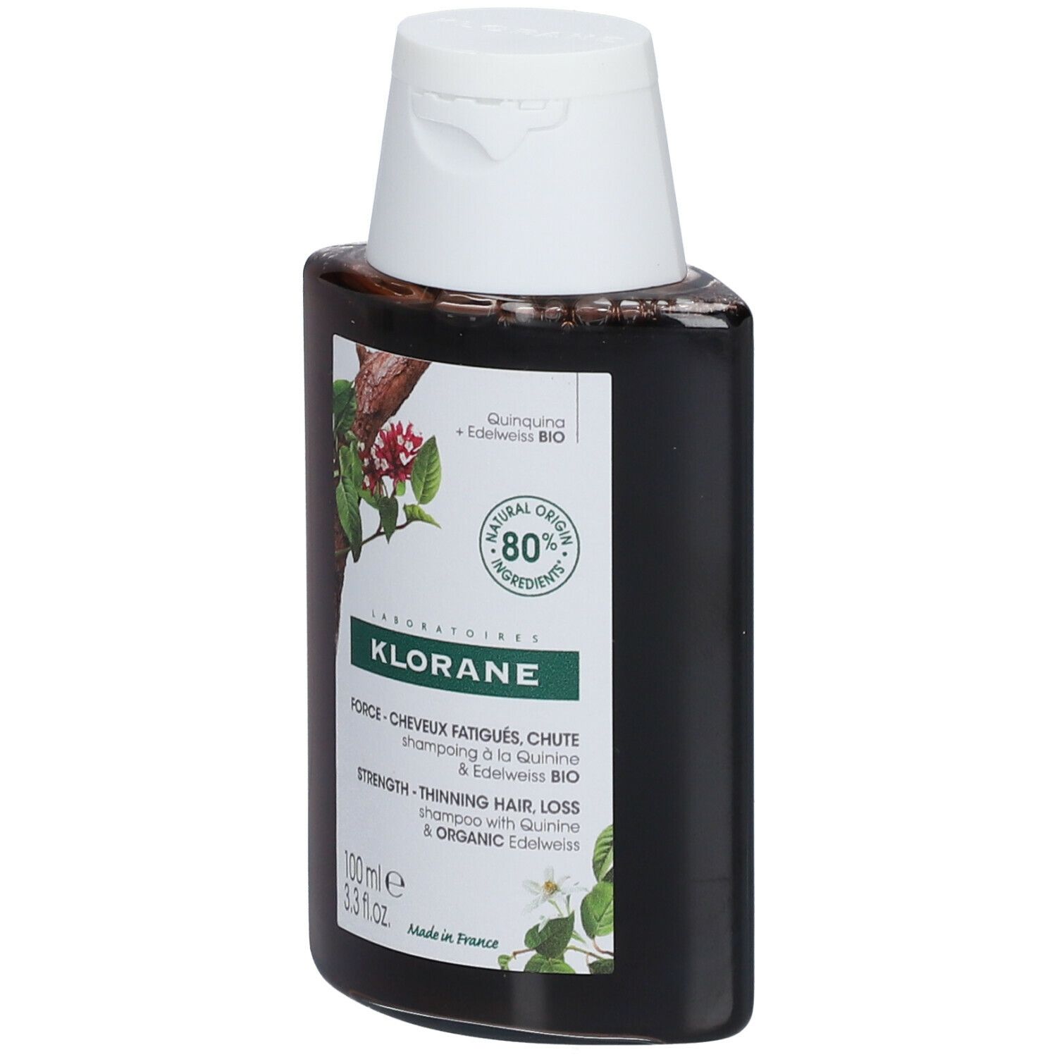 Flacon foncé avec bouchon blanc. Étiquette avec informations produit et logo. 80% ingrédients naturels.