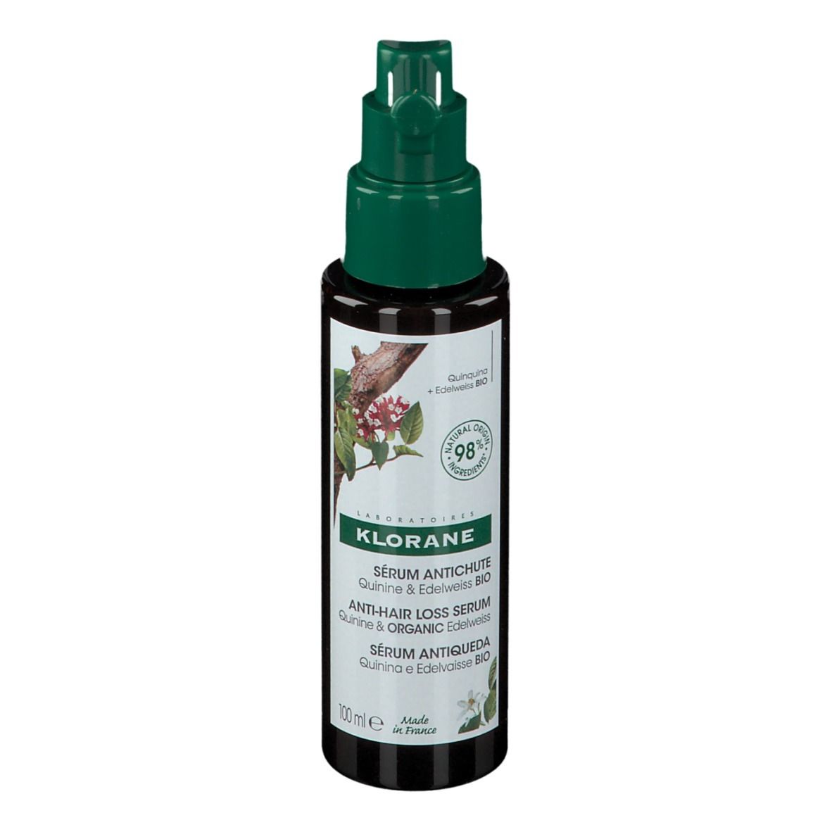 Bruine fles met groene spraykop. Opschrift: Sérum antichute, Anti-Hair Loss Serum. Met kinine & Edelweiss BIO. 98% ingrediënten van natuurlijke oorsprong.