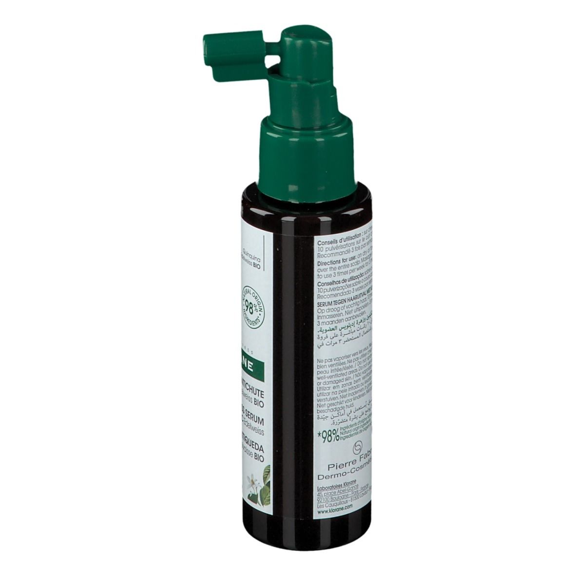 Bruine fles met groene spraykop. Achterkant met tekst. Opschrift: Sérum antichute, Anti-Hair Loss Serum. Met kinine & Edelweiss BIO. 98% ingrediënten van natuurlijke oorsprong.