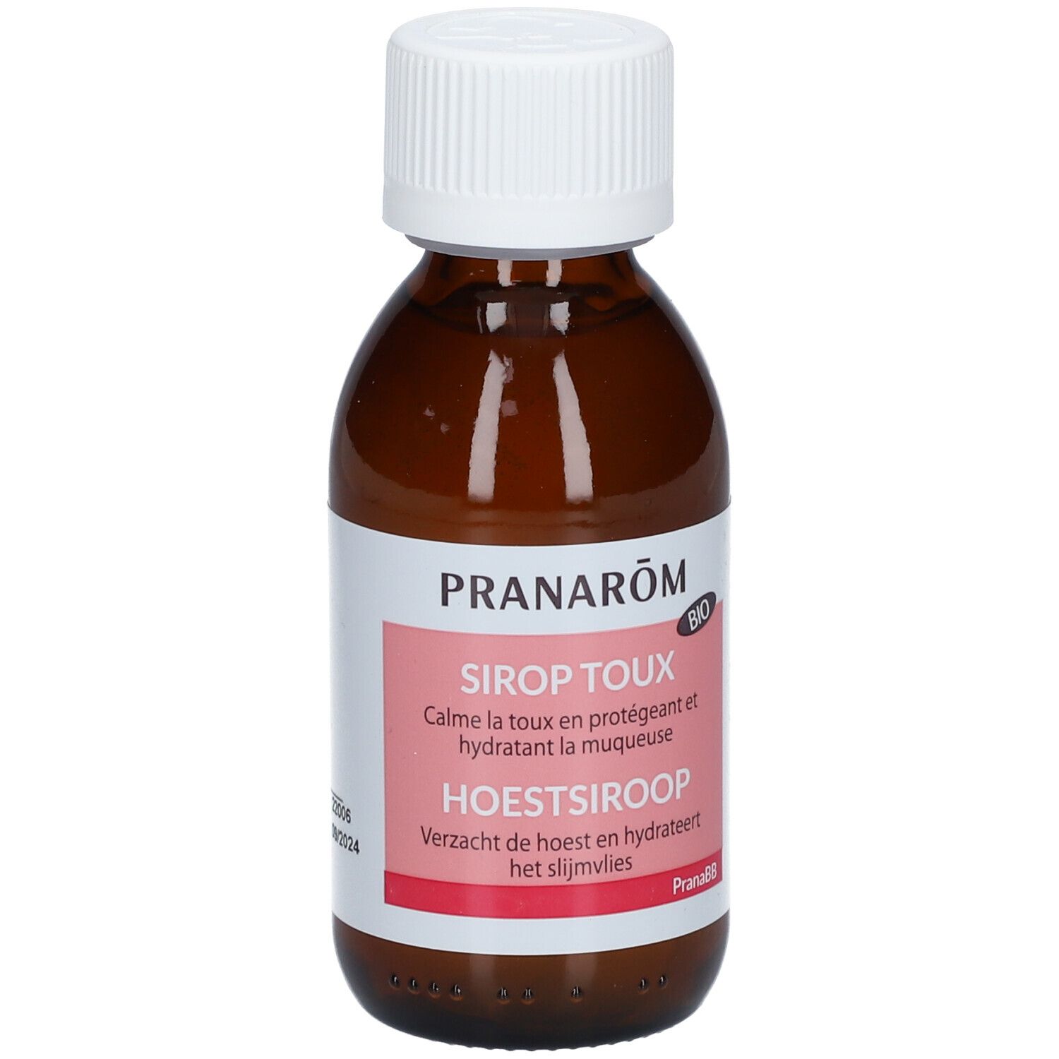 Flacon brun avec bouchon blanc. Étiquette avec texte: Sirop Toux, Hoestsiroop. Marque: Pranarôm. Certification bio.