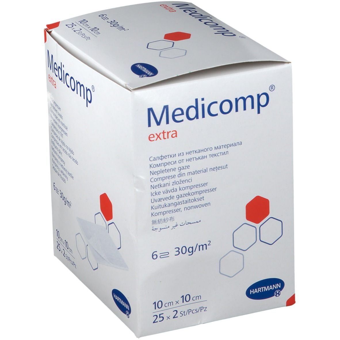Schuin geplaatste verpakking van Medicomp extra. Bevat kompressen. Meertalige productaanduidingen. Merk Hartmann.