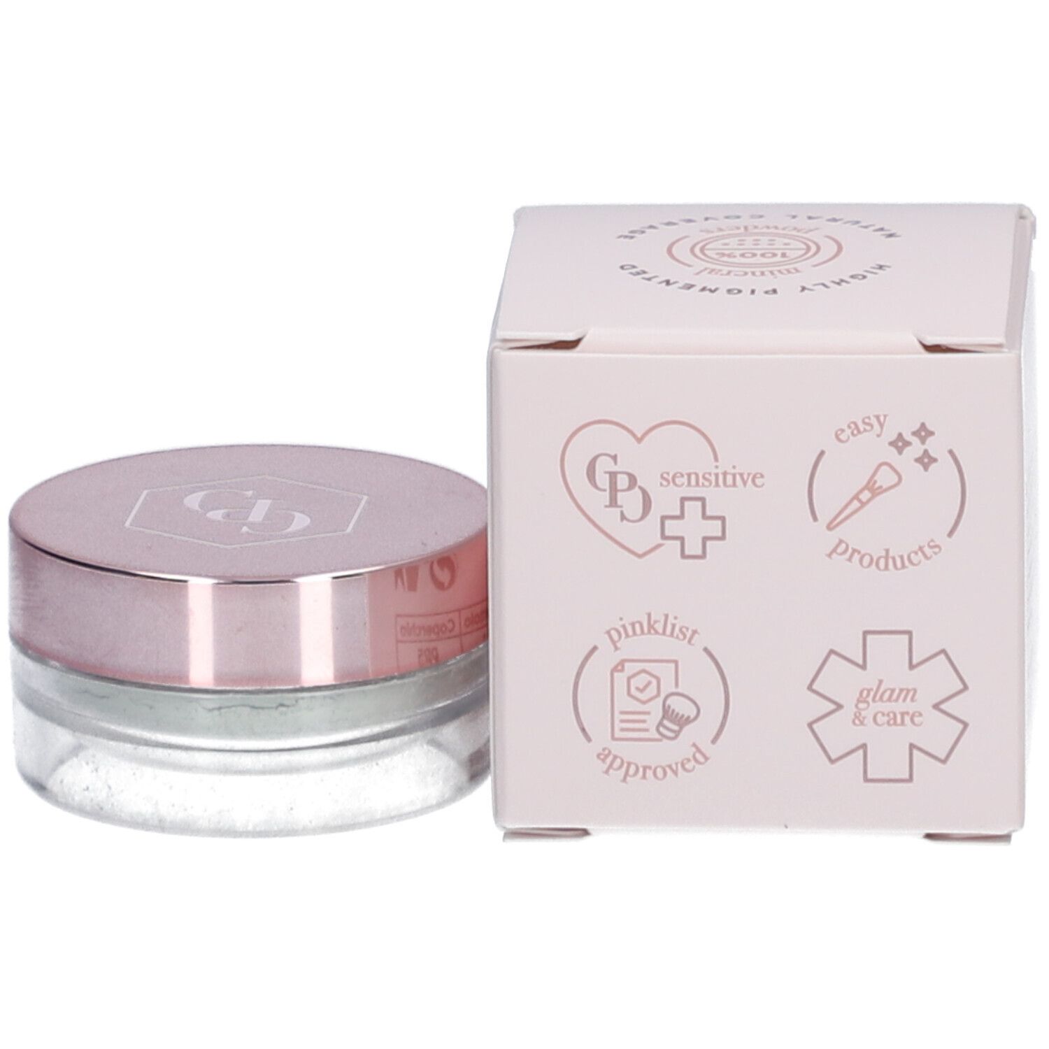 Mineral Concealer in Dose und Verpackung. Dose mit rosafarbenem Deckel. Verpackung mit Symbolen und Text.