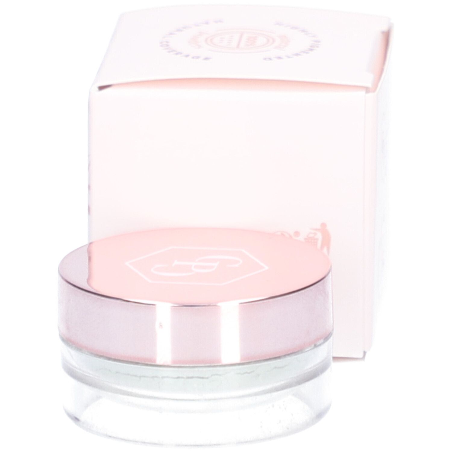 Mineral Concealer in Dose und Verpackung. Dose mit rosafarbenem Deckel. Verpackung im Hintergrund.