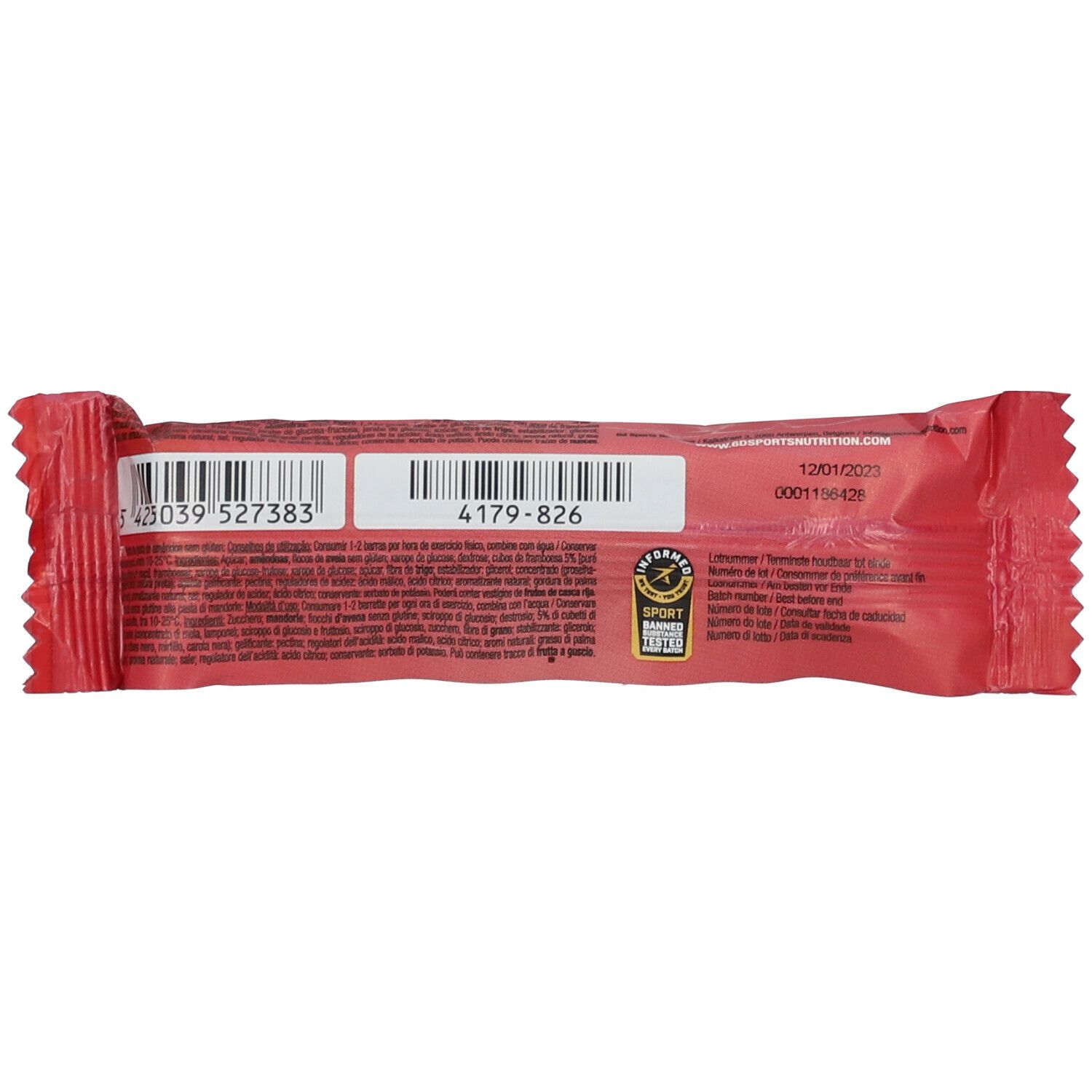 Rode verpakking. Barcode, tekst en logo. Opschriften: 4179-826, 12/01/2023, SPORT NUTRITION. Certificeringslabels.