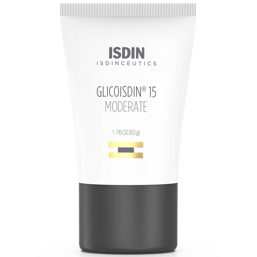Tube blanc avec bouchon noir. Nom et marque du produit imprimés. Lignes horizontales dorées.